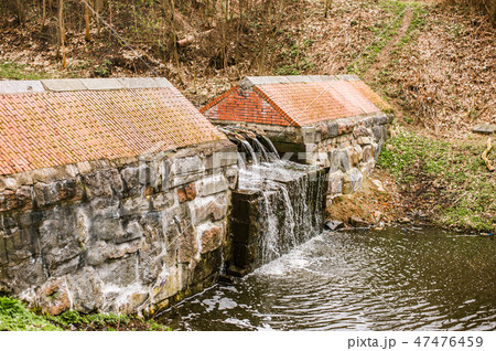 Little dam in Lithuanian creek in Kaliningrad 47476459