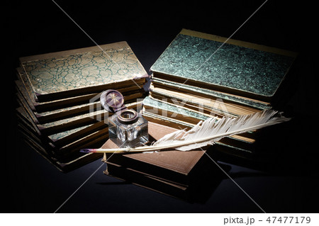 old books, papers, ink pen and inkpot 47477179