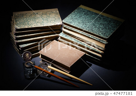 old books, papers, ink pen and inkpot 47477181