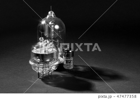 Old vacuum tube. Black and white. Old vacuum tube. Black and white. 47477358