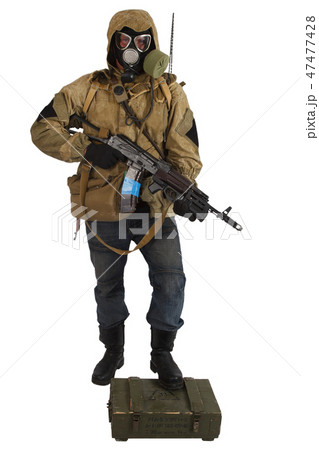 Post-apocalyptic stalker in gas mask with ak47 gun 47477428
