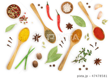 mix of spices in wooden spoon isolated on a white background. Top view. Flat lay. Set or collection mix of spices in wooden spoon isolated on a white background. Top view. Flat lay. Set or collection 47478581