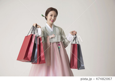 Korean beauty concept photo. Young beautiful woman wearing Hanbok, Korean traditional dress. 327 47482067