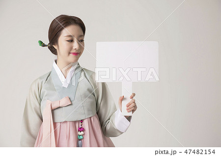 Korean beauty concept photo. Young beautiful woman wearing Hanbok, Korean traditional dress. 293 47482154