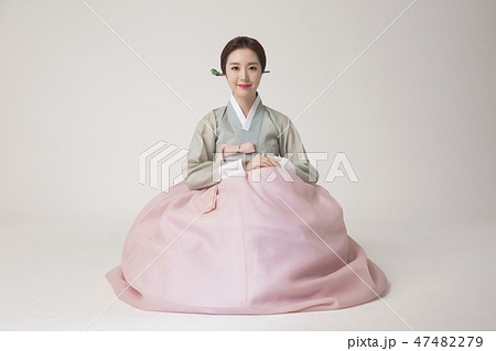 Korean beauty concept photo. Young beautiful woman wearing Hanbok, Korean traditional dress. 275 Korean beauty concept photo. Young beautiful woman wearing Hanbok, Korean traditional dress. 275 47482279