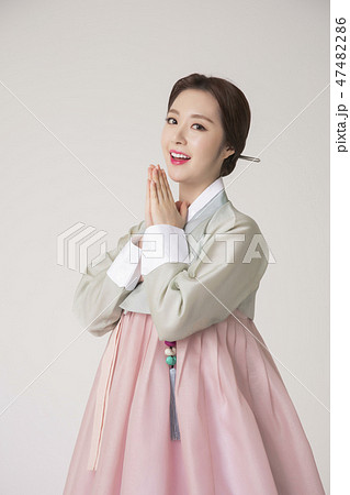 Korean beauty concept photo. Young beautiful woman wearing Hanbok, Korean traditional dress. 239 47482286