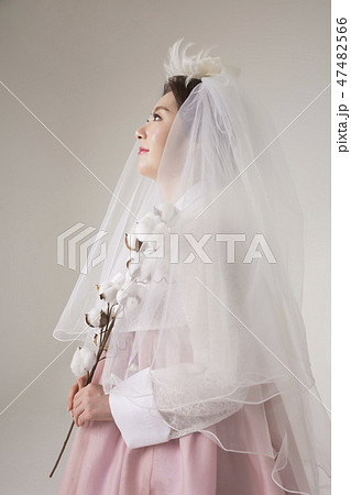 Korean beauty concept photo. Young beautiful woman wearing Hanbok, Korean traditional dress. 008 47482566