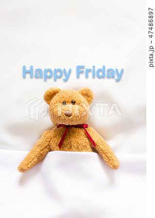 Teddy Bear lying in bed with message" Happy Friday 47486897