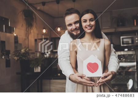 Portrait smiling couple in love standing embracing 47488683