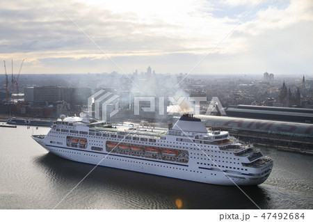 Large cruise ship in the harbor of Amsterdam 47492684