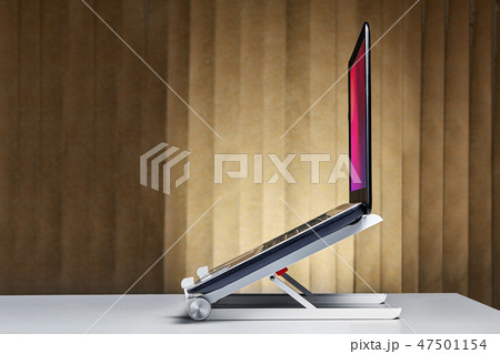 Laptop stand desk dock holder with notebook. 47501154