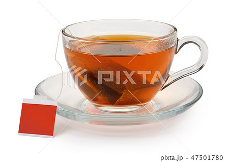 Tea in a glass cup on white background 47501780