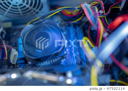 PC components in dust. CPU fan is work. Dusty power wires PC components in dust. CPU fan is work. Dusty power wires 47502114