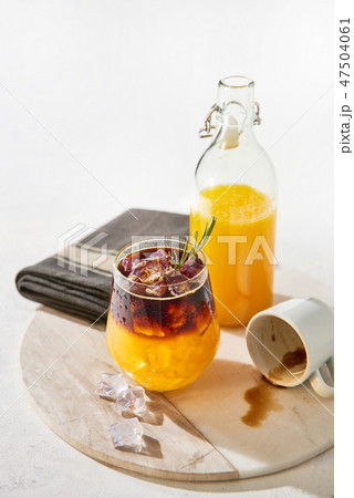 Orange juice espresso with ice Orange juice espresso with ice 47504061