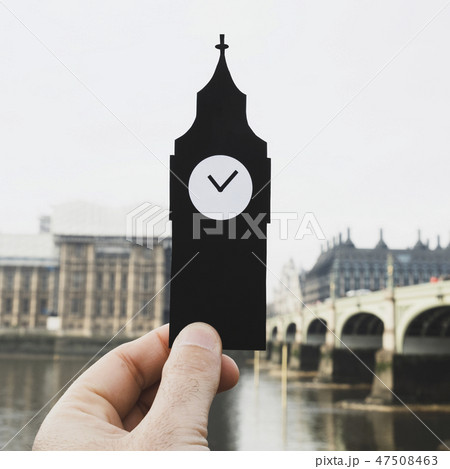 man holding the Clock Tower in London, UK. 47508463