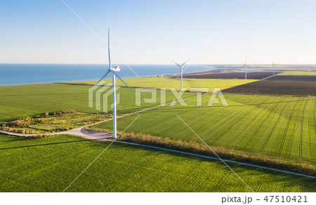Wind power station on the field. Wind power station on the field. 47510421