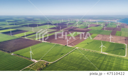 Wind power station on the field. Wind power station on the field. 47510422