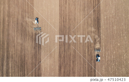 Farm machinery on the field. Agriculture 47510423