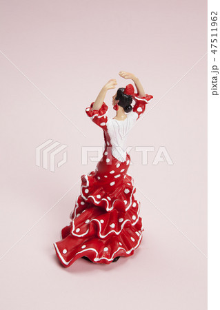 flamenco dancer figurine on a pop pink background 47511962