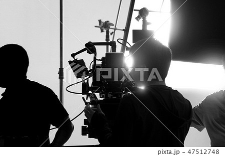 Behind video camera recording online commercial Behind video camera recording online commercial 47512748