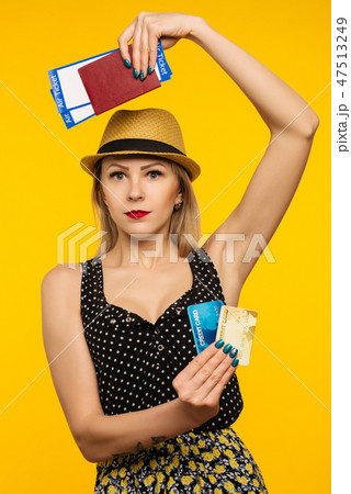 excited student holding pass ticket , credit card excited student holding pass ticket , credit card 47513249