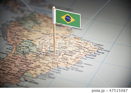 Brazil marked with a flag on the map 47515087