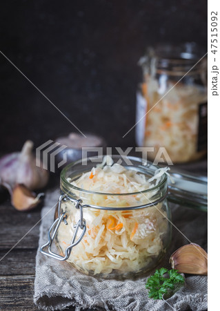 Glass jar with homemade sauerkraut Glass jar with homemade sauerkraut 47515092