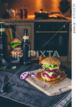 Dinner with Cheeseburger and Some Beer Dinner with Cheeseburger and Some Beer 47515574