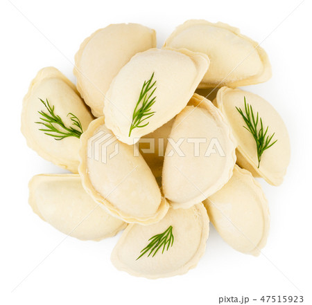 Heap of dumplings with dill leaves on a white. The 47515923