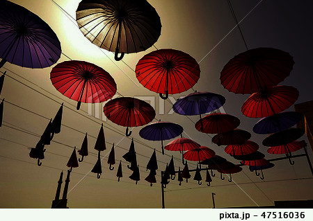 colorful umbrellas against sky in city settings 47516036