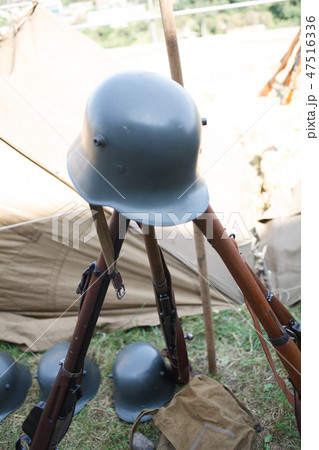 Rifles pyramids and helmets, First World War-era  Rifles pyramids and helmets, First World War-era  47516336