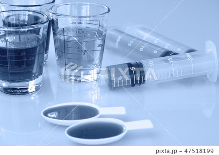 Syrup medication and measurement tools. 47518199