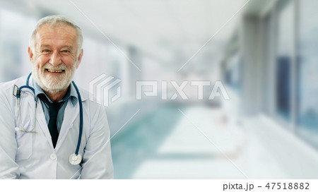 Senior male doctor working at the hospital. Senior male doctor working at the hospital. 47518882
