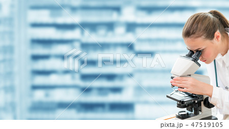 Scientist researcher uses microscope in laboratory 47519105