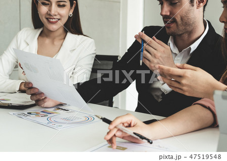 Businessman and businesswomen working in office. Businessman and businesswomen working in office. 47519548