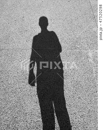 Shadow silhouette of a man on the floor. 47520298