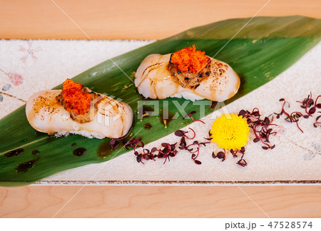Japanese Engawa sushi on ceramic plate Japanese Engawa sushi on ceramic plate 47528574