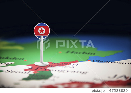 North Korea marked with a flag on the map 47528829