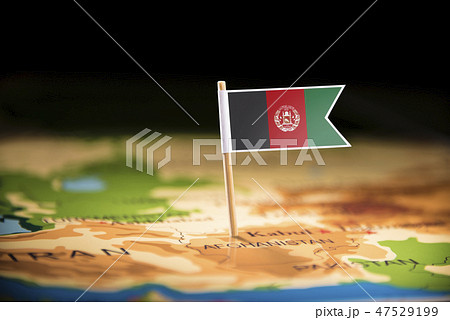 Afghanistan marked with a flag on the map 47529199