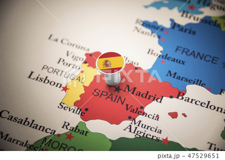 spain marked with a flag on the map 47529651