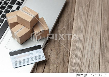 Delivery of the order from the online store. Shopping with payment online. Boxes with goods with Delivery of the order from the online store. Shopping with payment online. Boxes with goods with 47531787