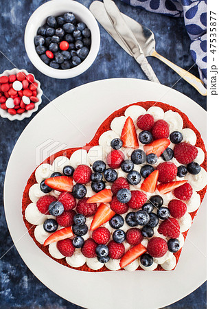 Delicious homemade heart shaped red velvet cake 47535877