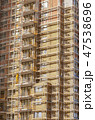 Building construction site with scaffolding 47538696