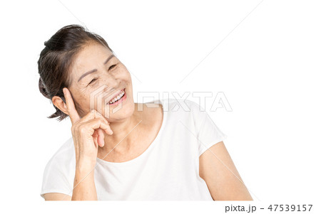 Old asian woman thinking with copy space 47539157