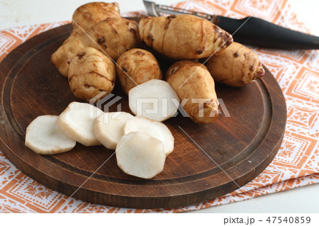 Jerusalem artichokes on a cutting board 47540859