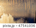 Sunset the sun shines through the frozen window 47541036