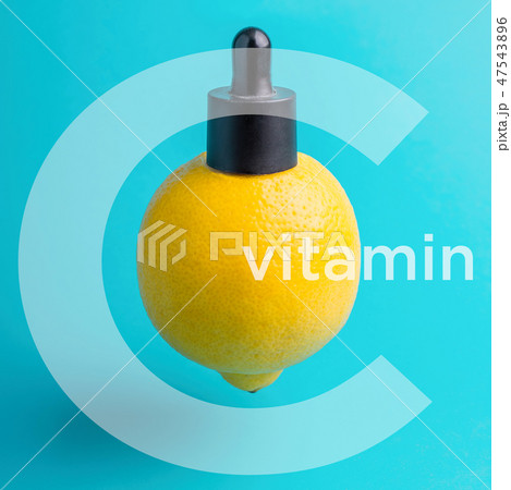 Vitamin C. lemon with cap and pipette. Essential oil, serum, or essential oil 47543896