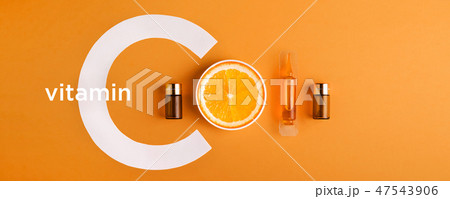 Serum and cosmetics with vitamin C. Essential oil from citrus fruits. banner 47543906