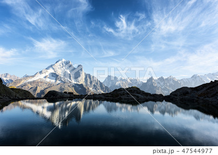 Colourful sunset on Lac Blanc lake in France Alps Colourful sunset on Lac Blanc lake in France Alps 47544977