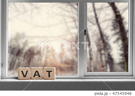 VAT sign on a window sill in the morning sunrise 47545046